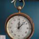 Patinated inlaid wooden clock shape watch pocket