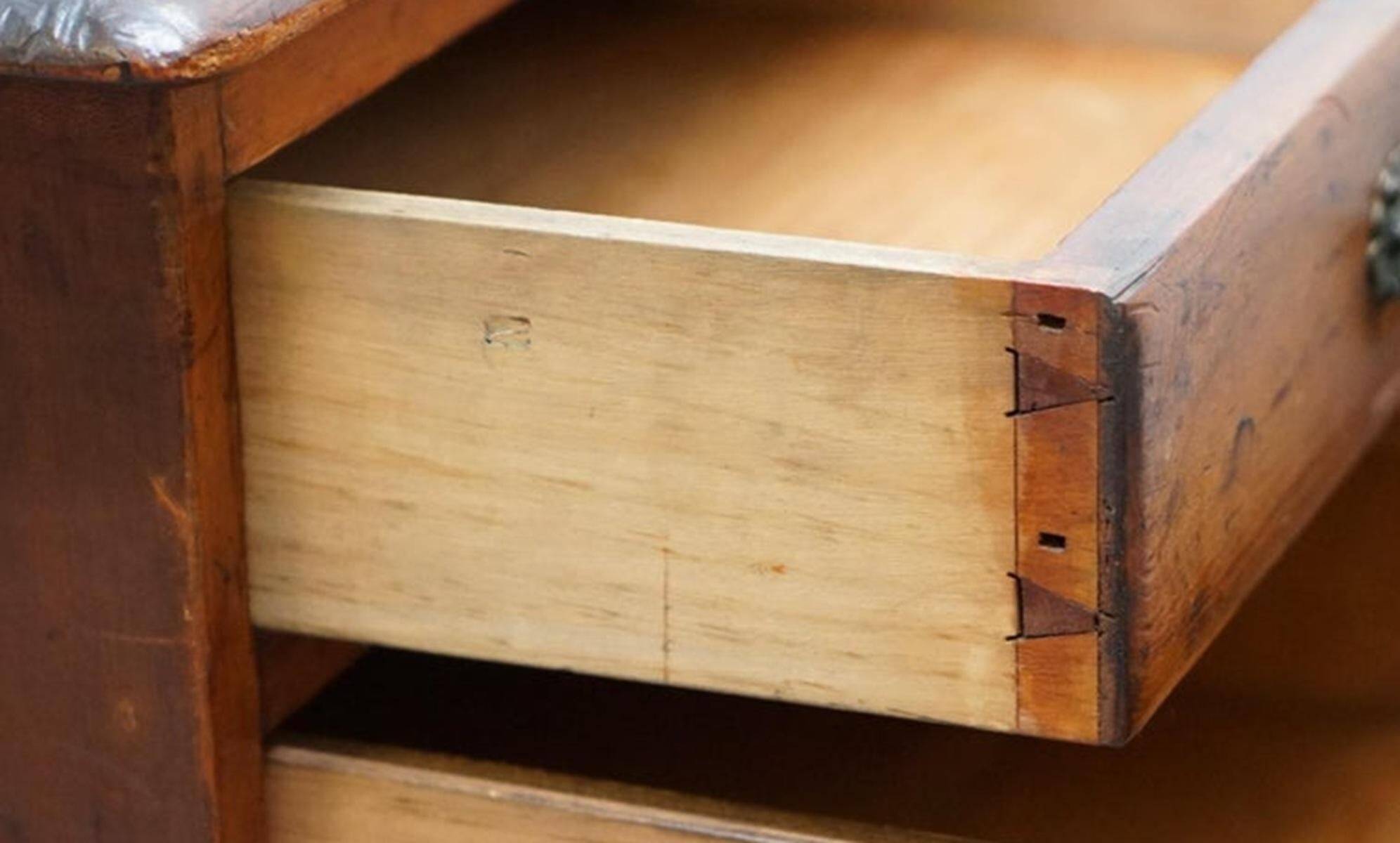 Small Victorian desk in solid walnut with drawers.