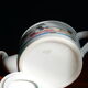 Limoges coffee maker inspired by ancient Egypt in the style of the 80s