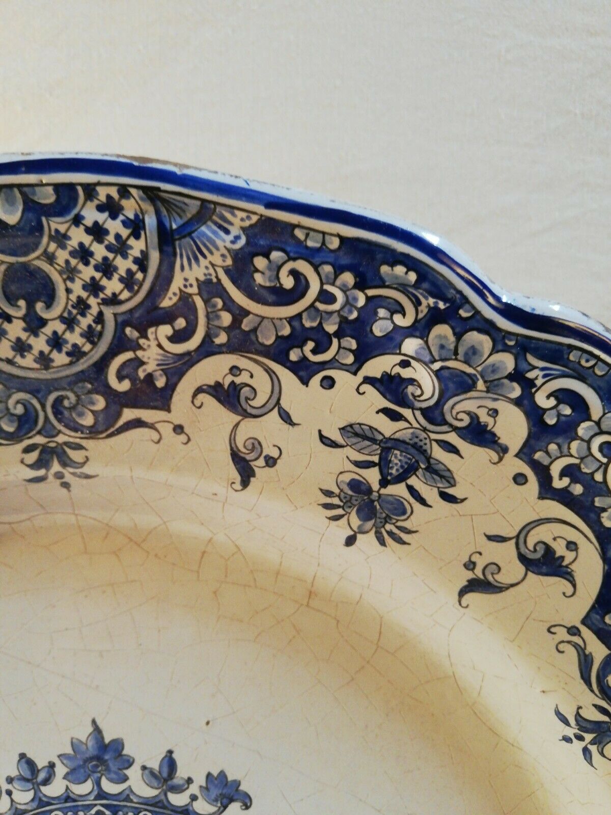 Rouen earthenware dish decorated coat of arms