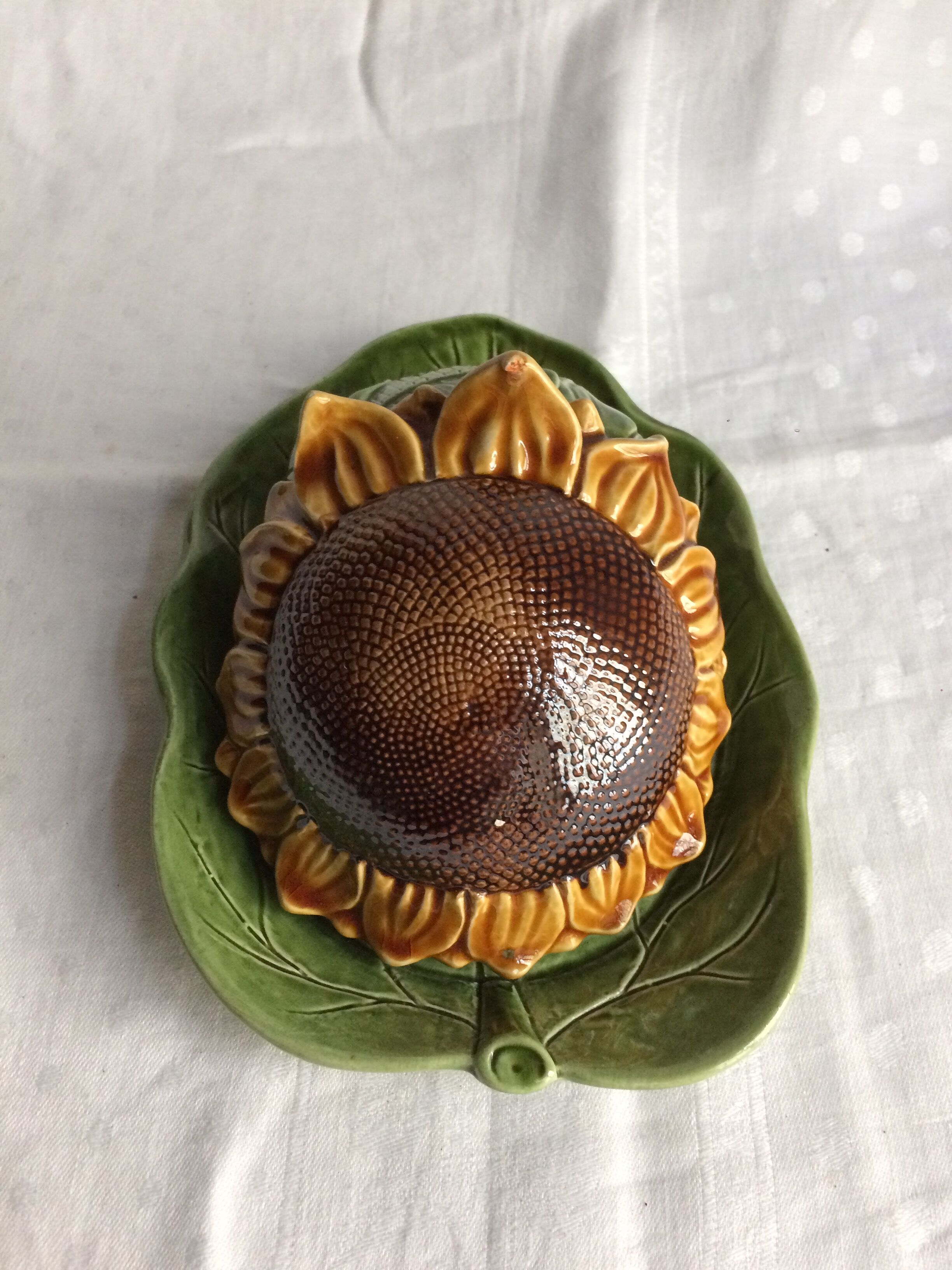 Butter dish in slip leaf and sunflower flower