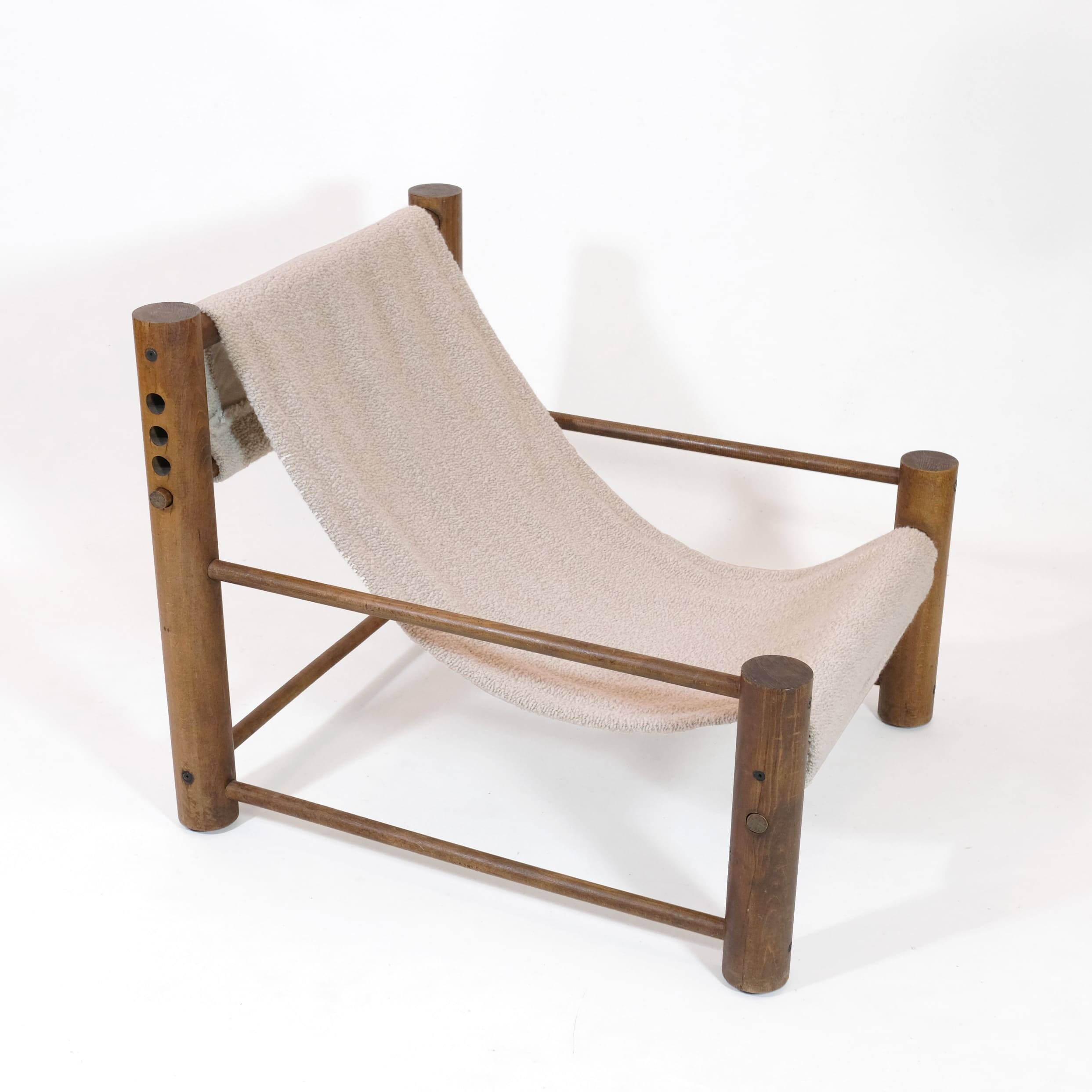 Solid wood armchair with adjustable backrest.