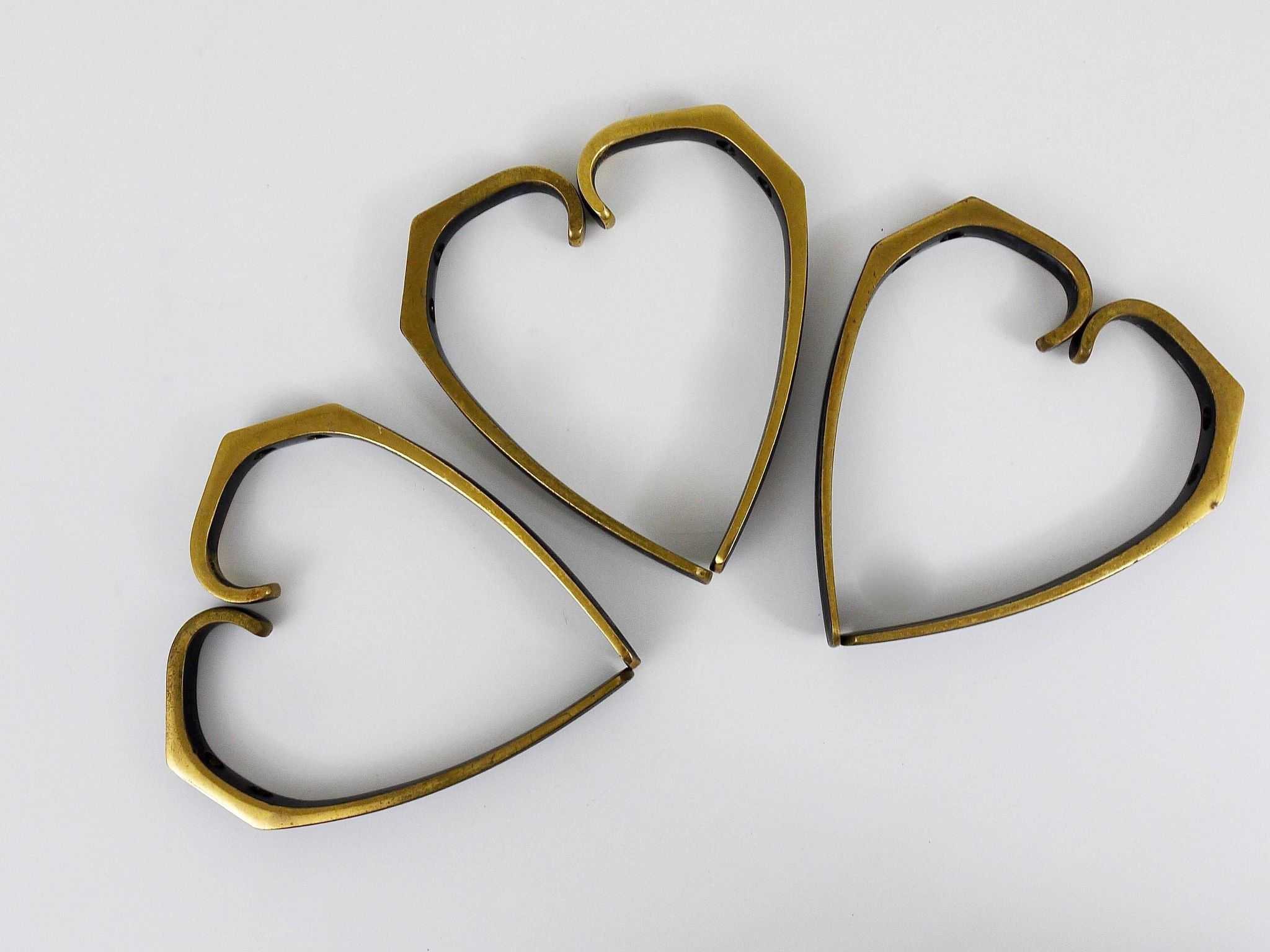 Up to 2 mid-century brass wall hooks by Hertha Baller, Austria, 1950s.