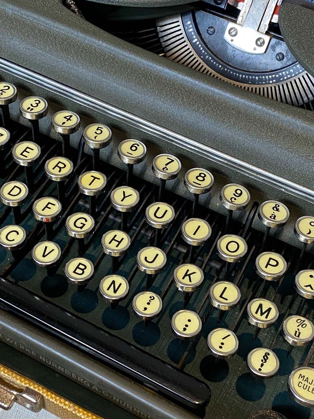 Triumph perfekt typewriter with its transport box.