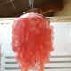 Suspension with pink mother-of-pearl tablets