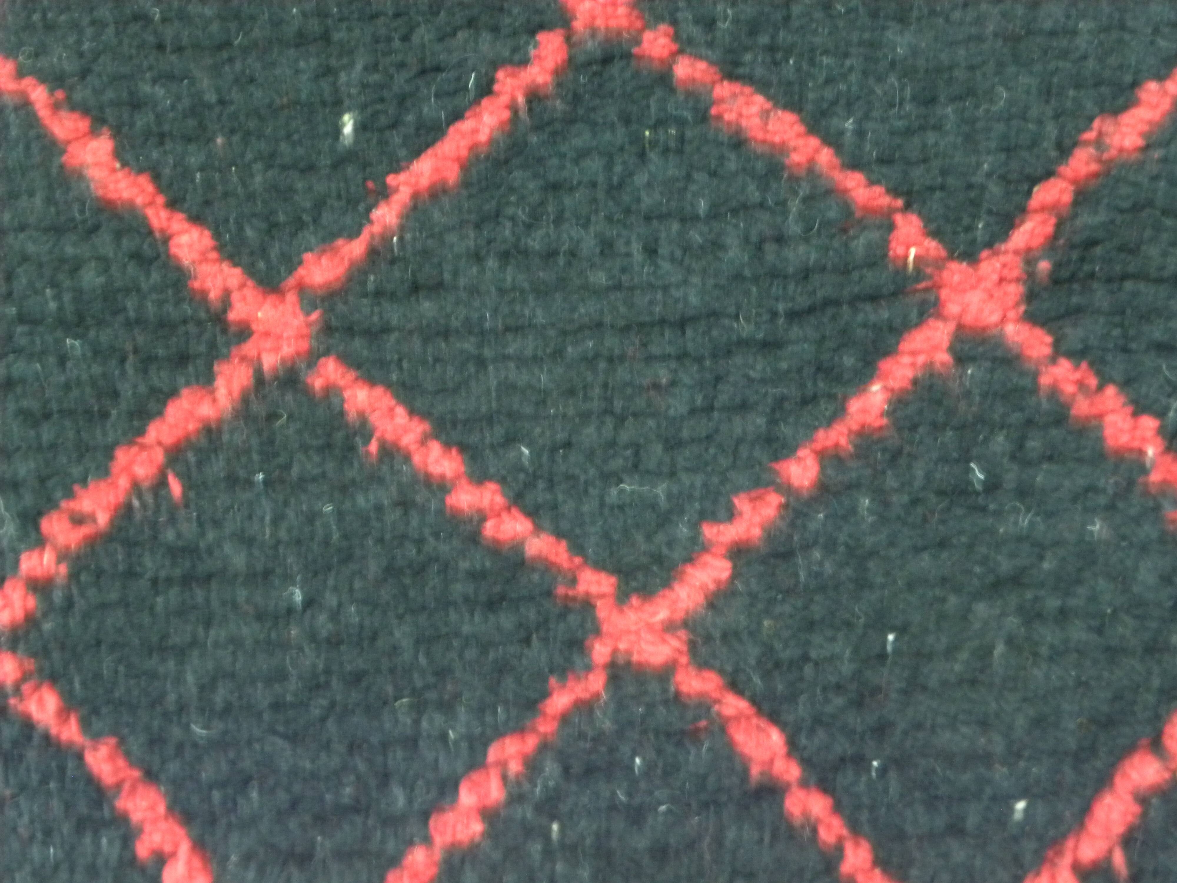 Vintage ancestral black Berber rug in wool