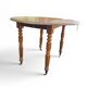Antique drop-leaf table in wood, with turned legs and castors.