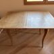 Folding game table in Louis XV style in cerused oak with cabriole legs.