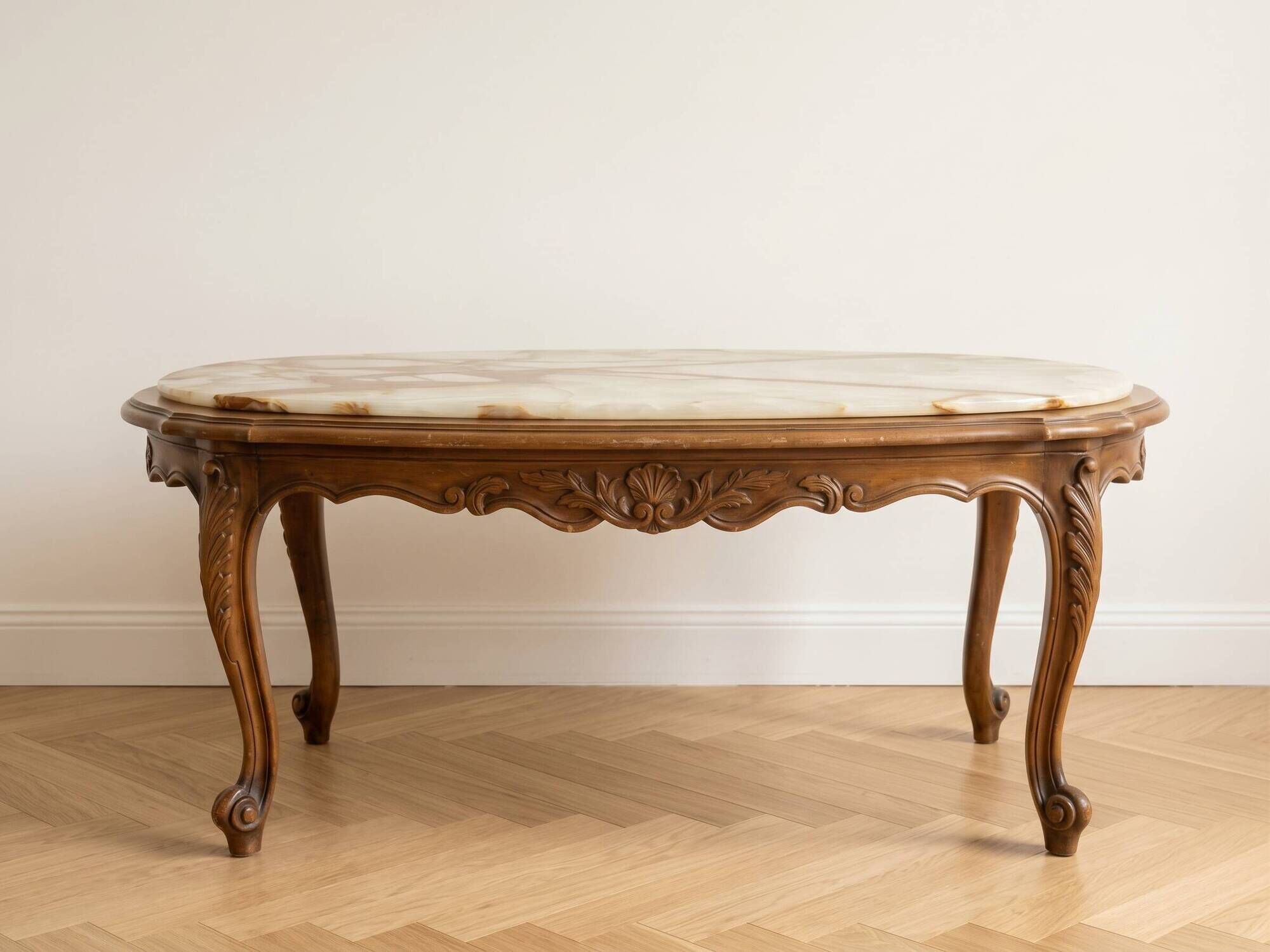 Oval coffee table in Louis XV style made of onyx and solid wood.