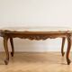 Oval coffee table in Louis XV style made of onyx and solid wood.