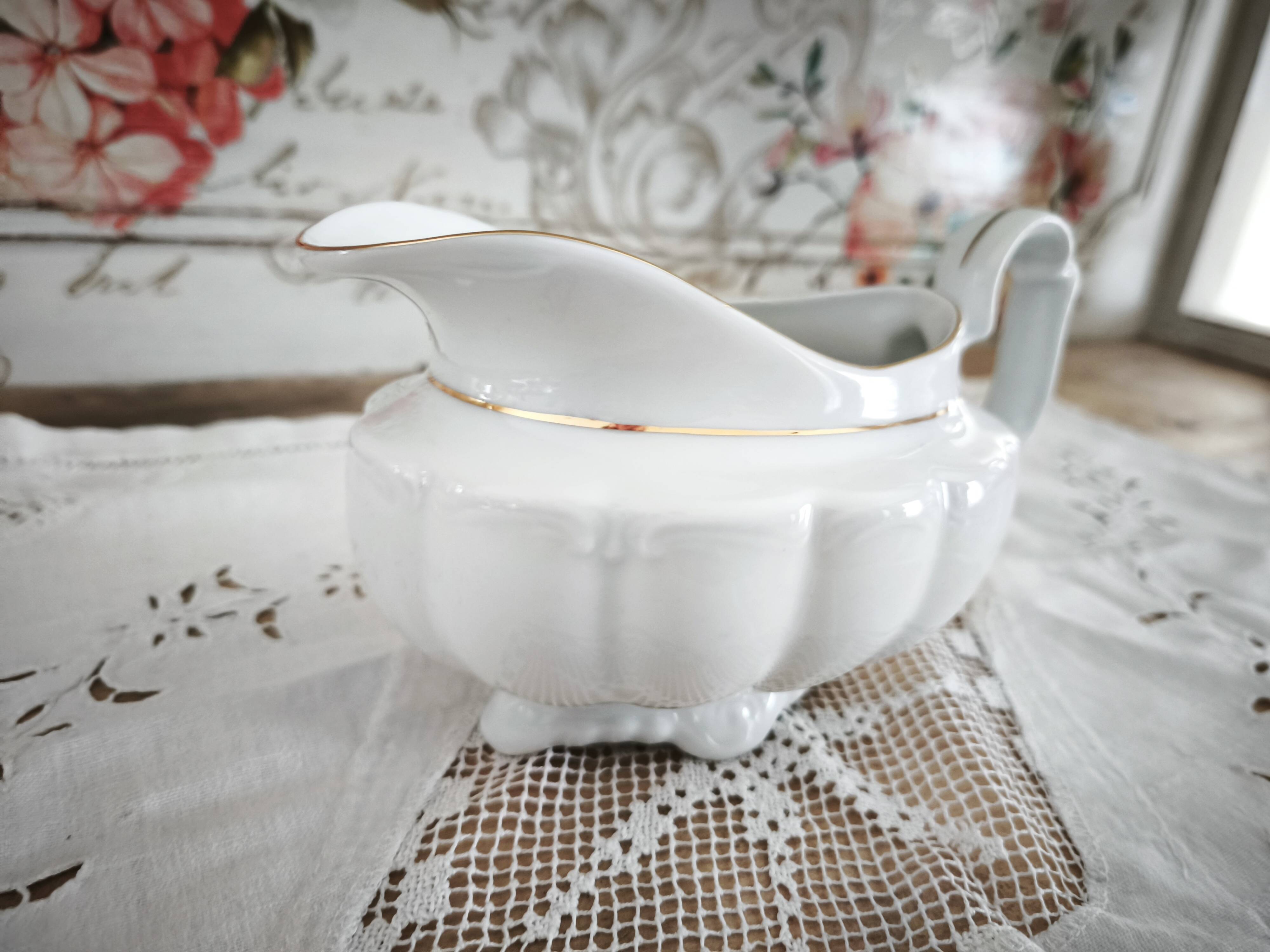 Porcelain sauceboat, white manufacture with double gold line, hand-painted.