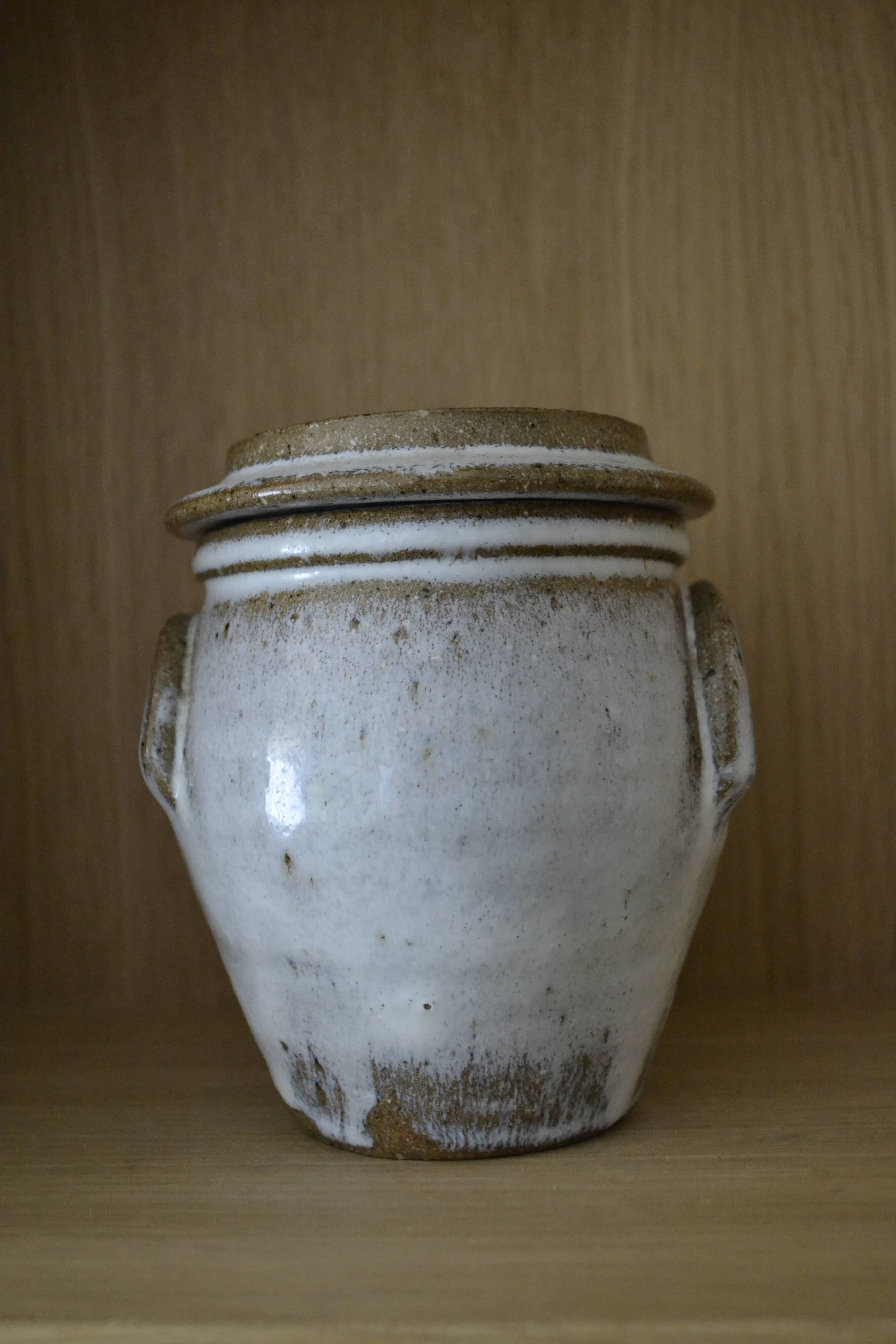 Artisanal beige sandstone pot