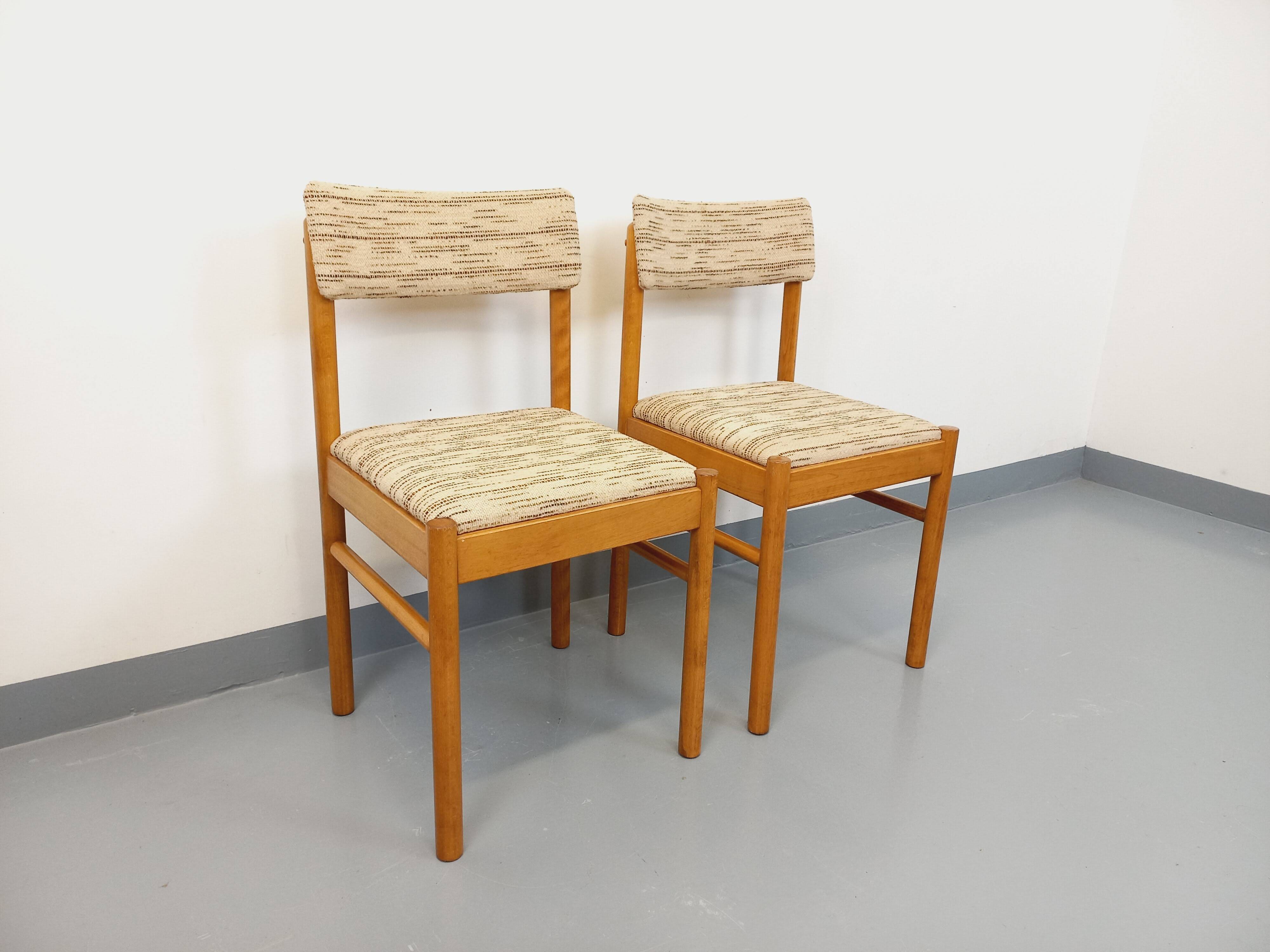Pair of vintage Baumann chairs in wood and fabric from the 70s