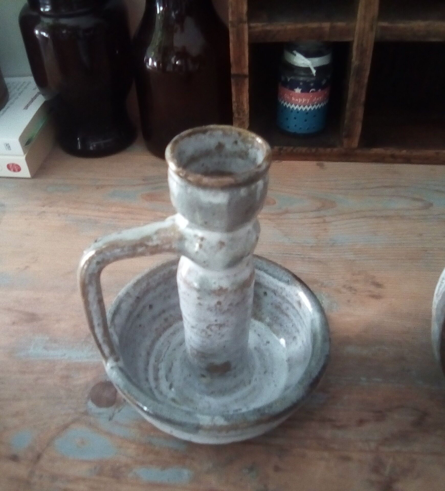 Pair of speckled sandstone candle holders