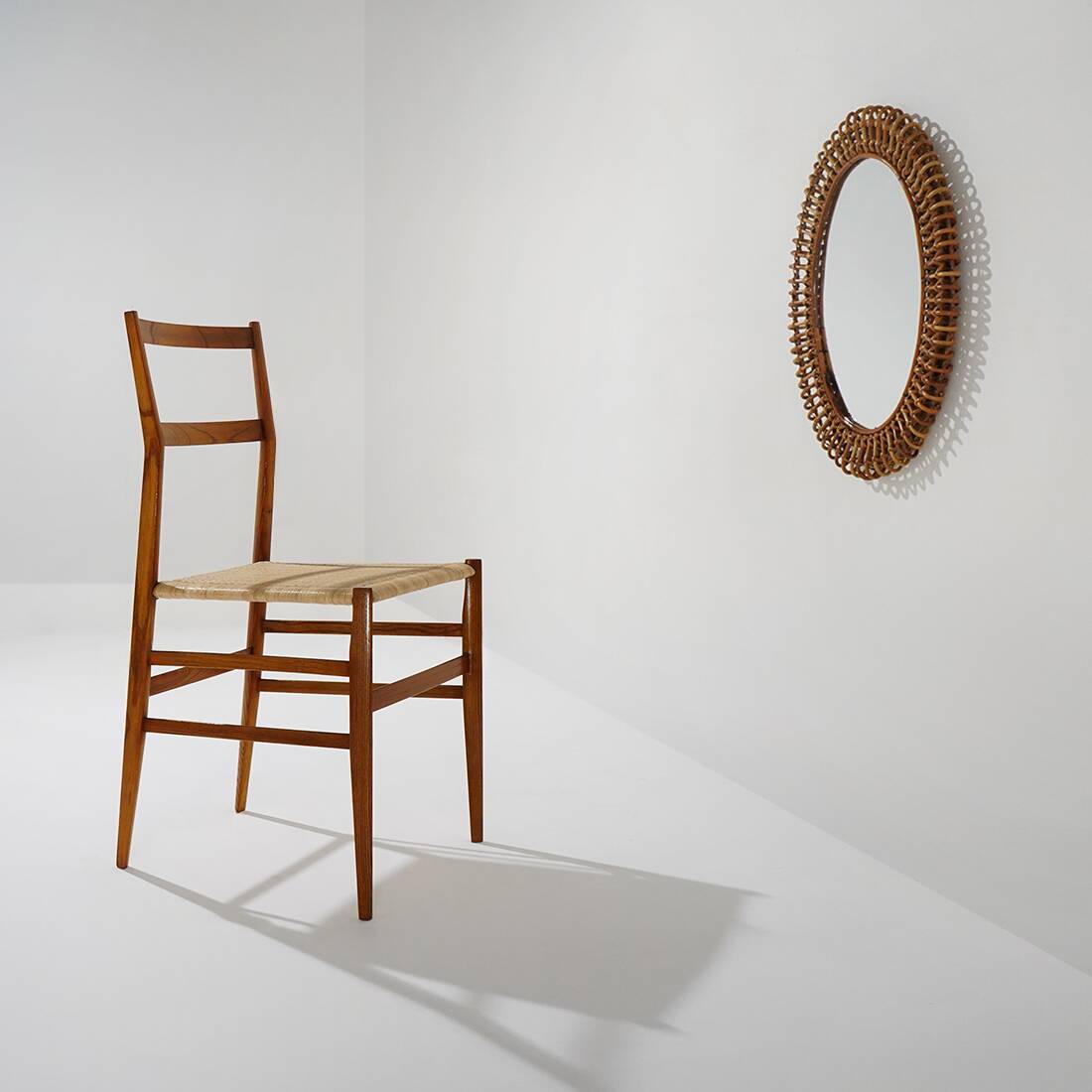 Wall mirror with rattan frame, 1950s