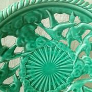 Twisted and pierced ceramic fruit bowl with a duck motif from the 1950s.