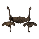 Wall-mounted coat rack in cast iron