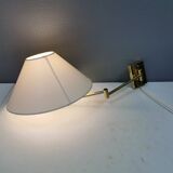 Danish Brass wall lamp with a ‘swivel’ effect.