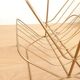 Vintage gold metal magazine rack