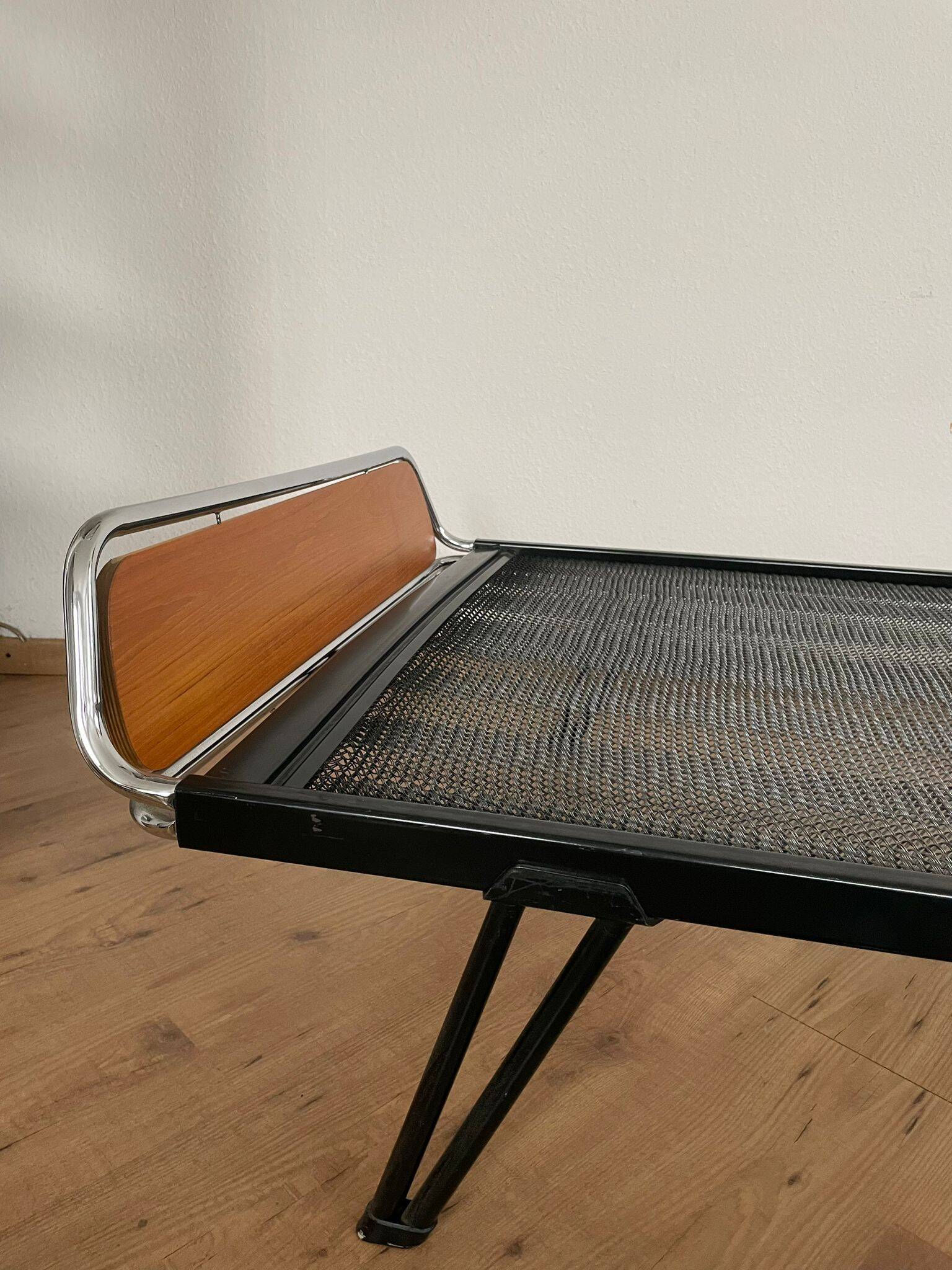 Pair of teak and chrome beds with mattress
