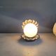Vintage shell lamp in black porcelain with opaline globe.