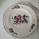 Set of three antique hand-painted plates