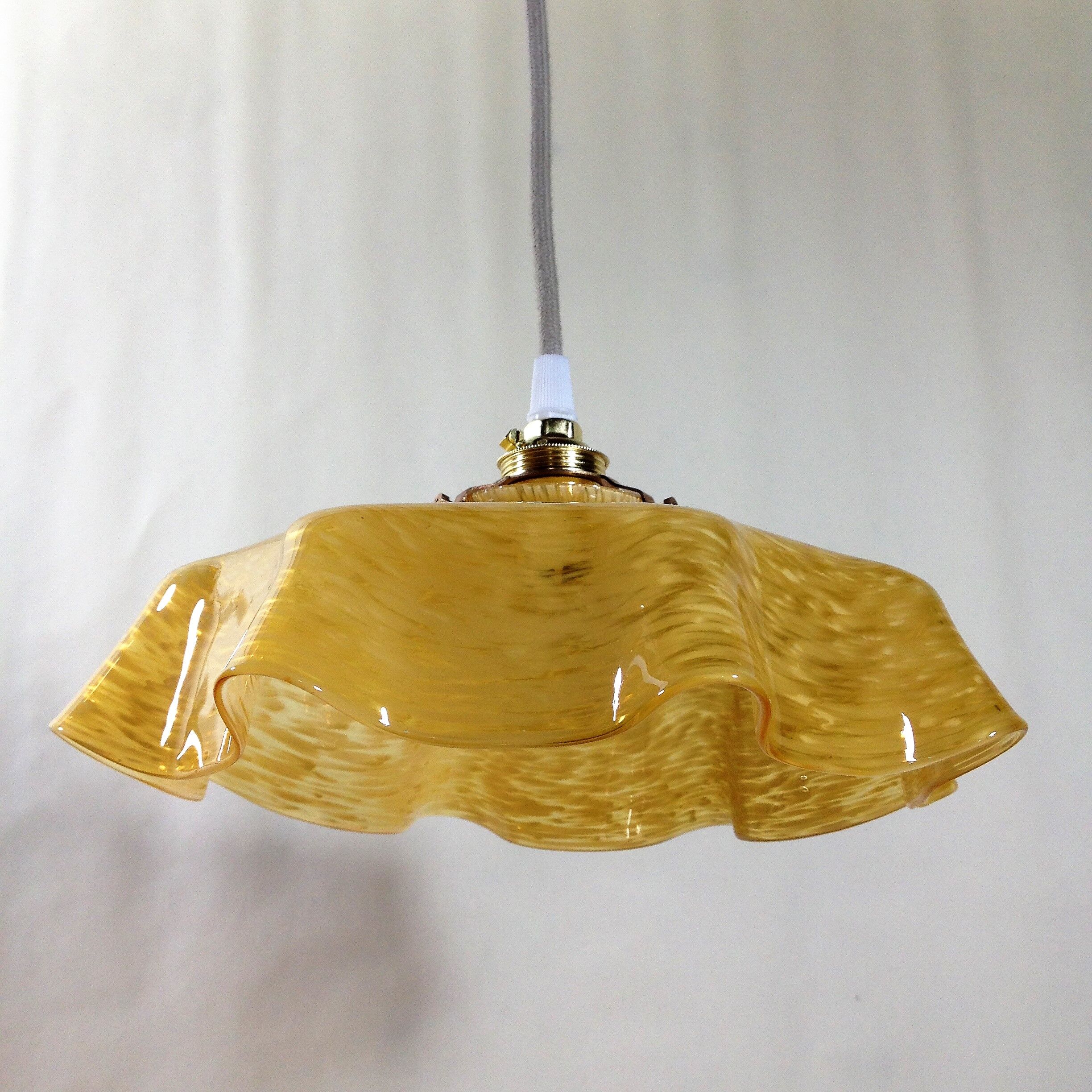 Hanging art deco glass of clichy yellow mustard