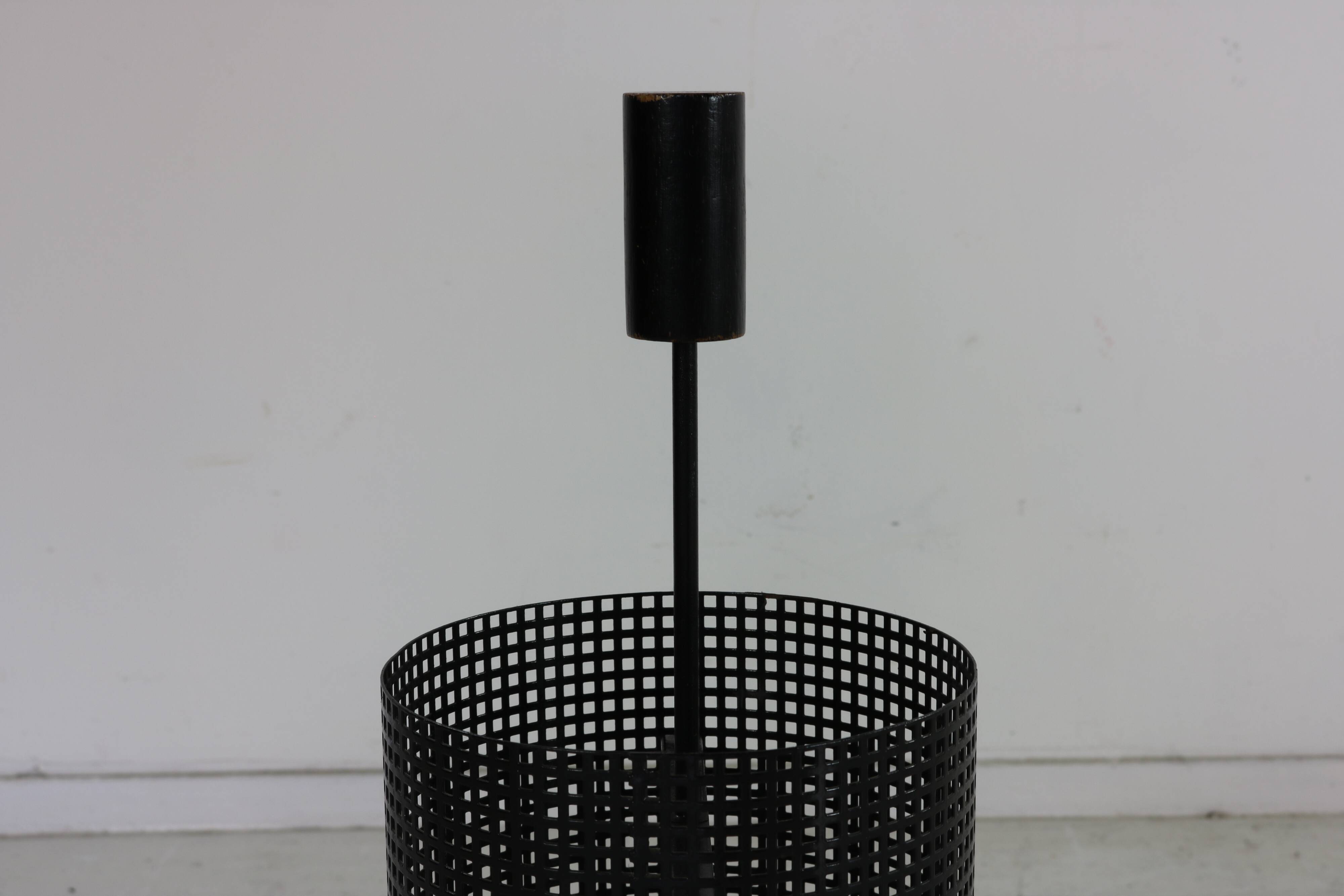 Minimalistic dutch design perforated metal umbrella stand