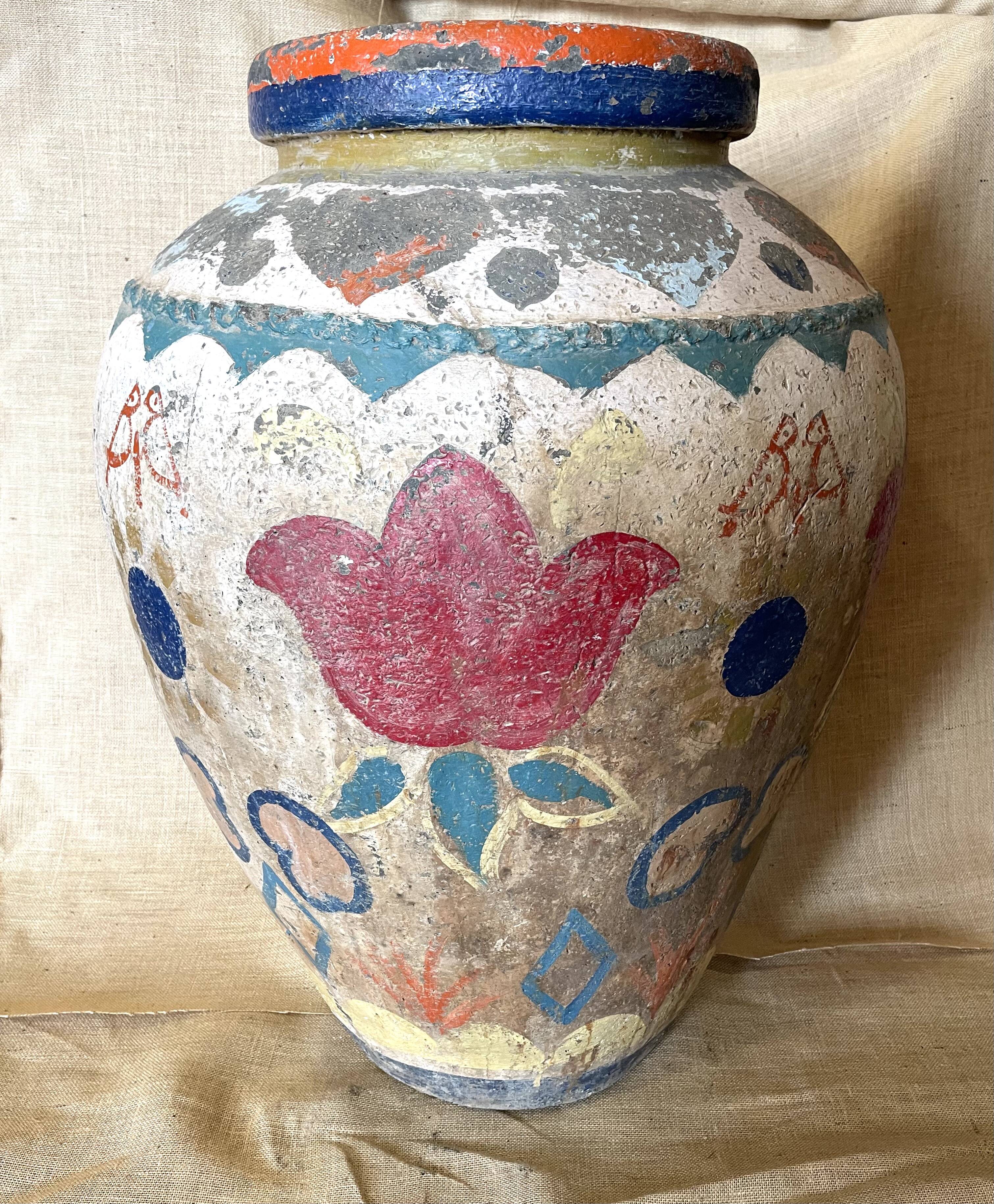 Polychrome decorated terracotta jar