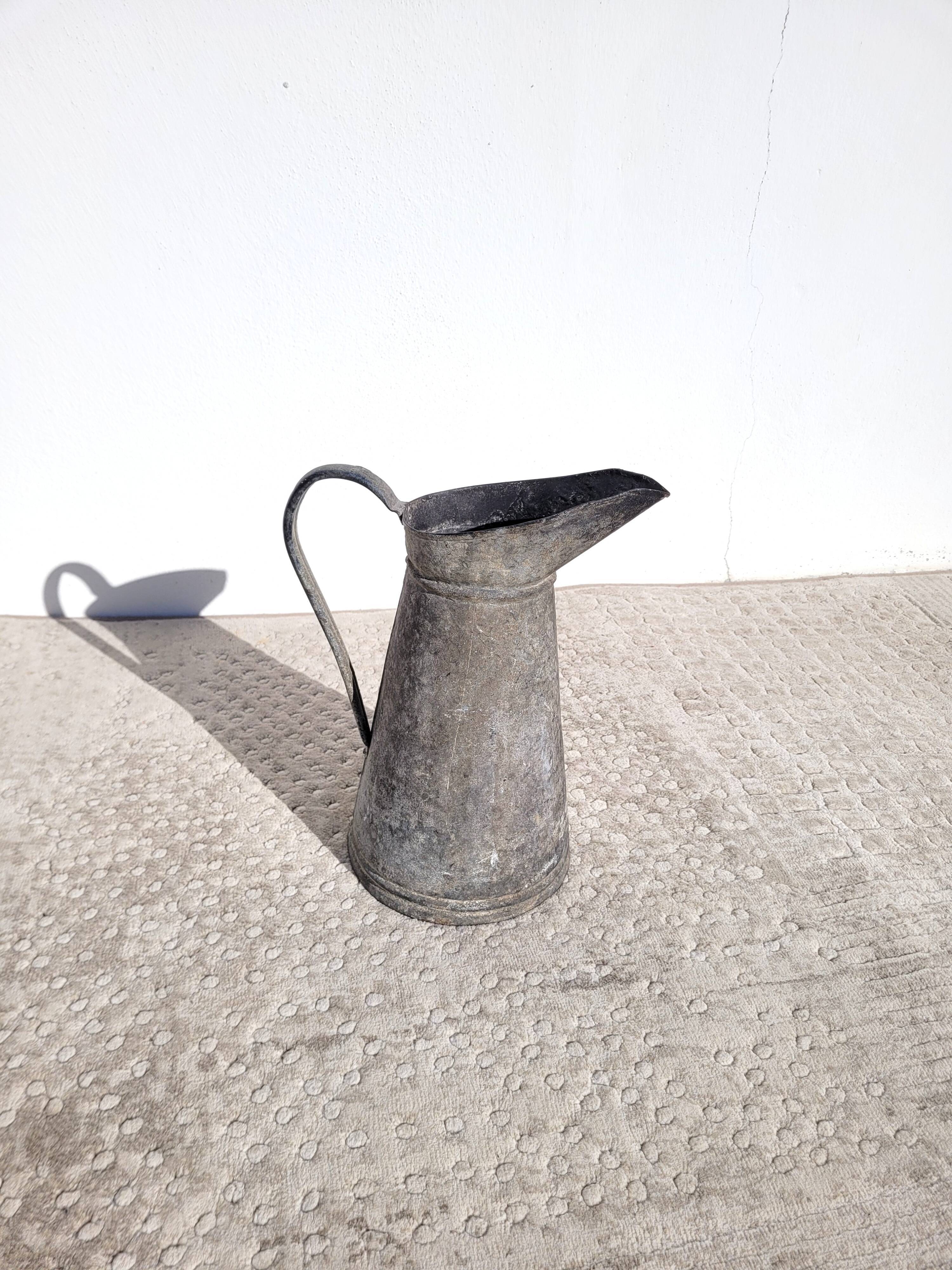 Old vintage zinc pitcher