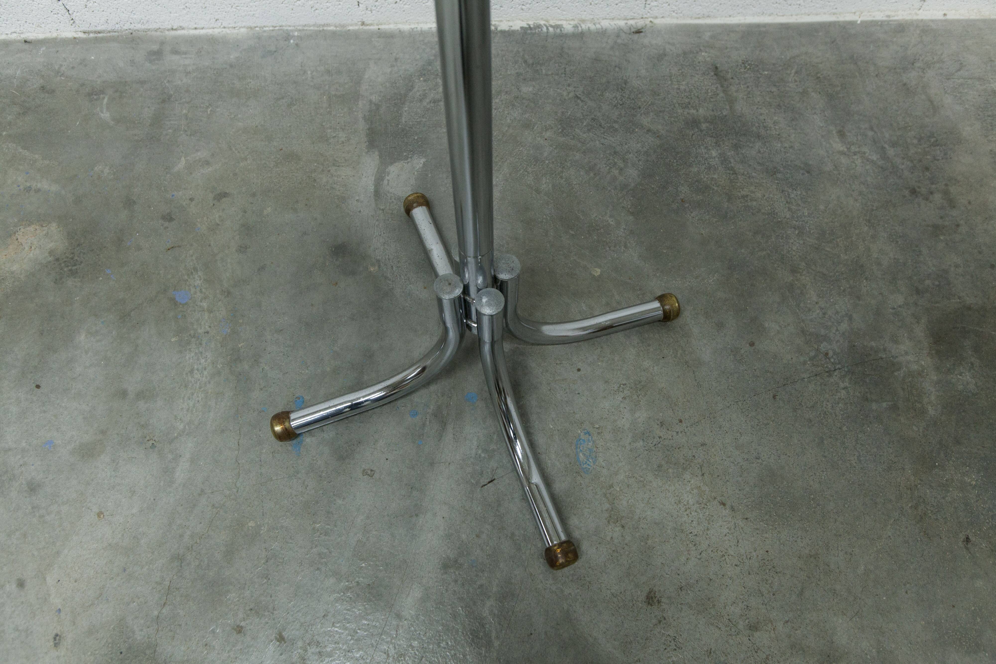 Coat rack with 12 chrome and black plastic hooks, 1960, 2m.