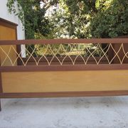 Wood and rattan child bed