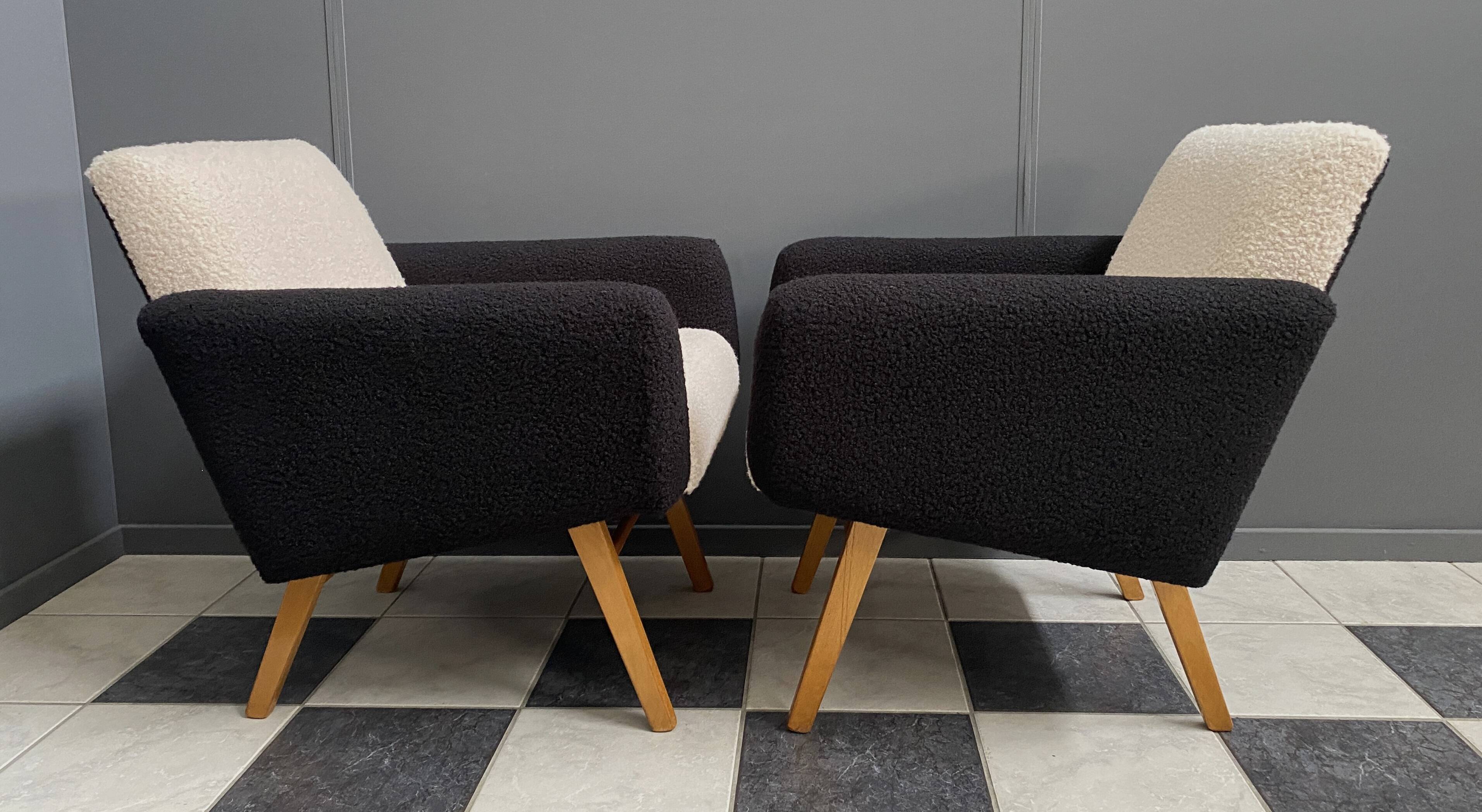 set of 2 black and White boucle lounge chairs 1960s
