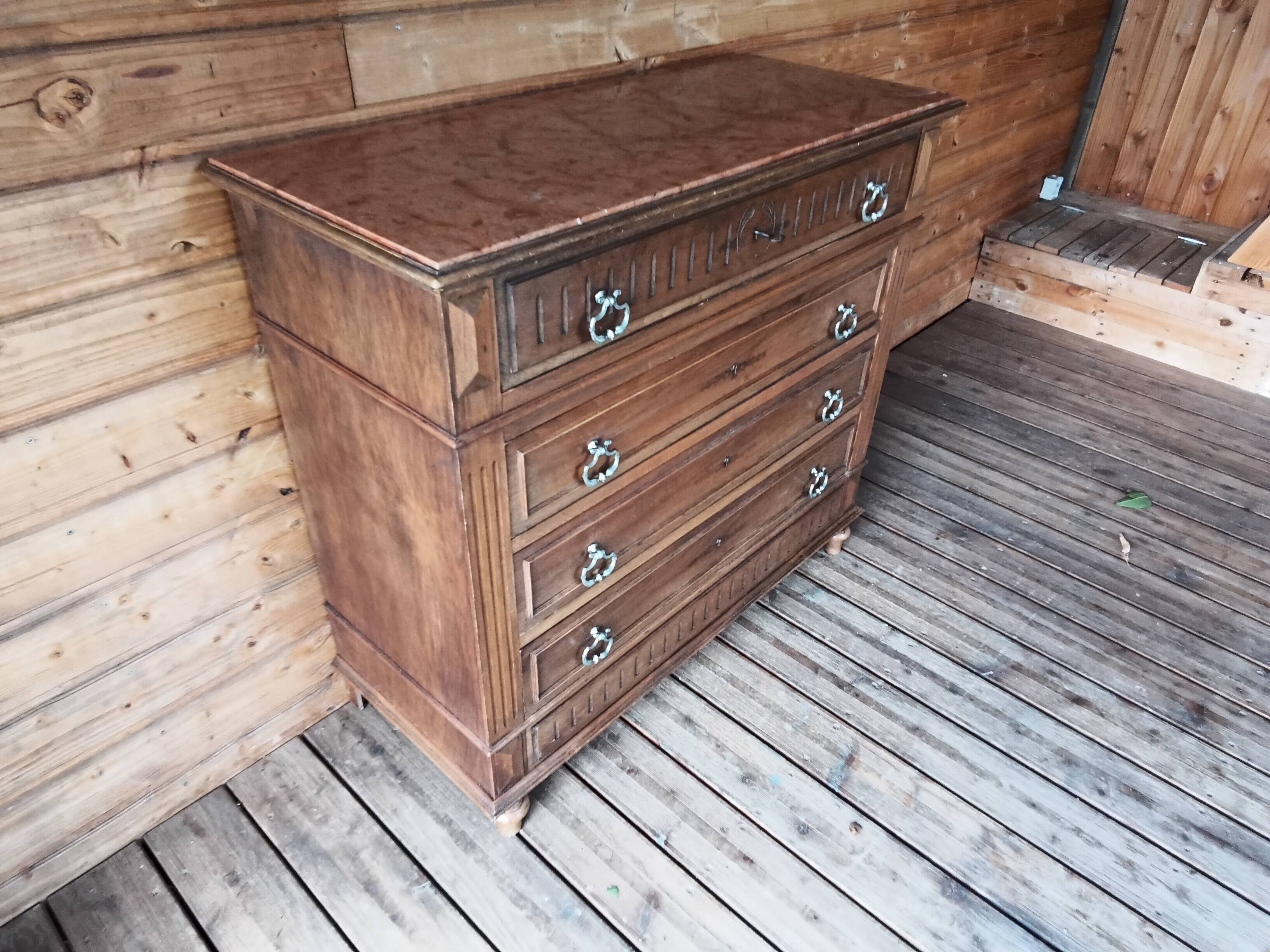 Antique chest of drawers with marble top
