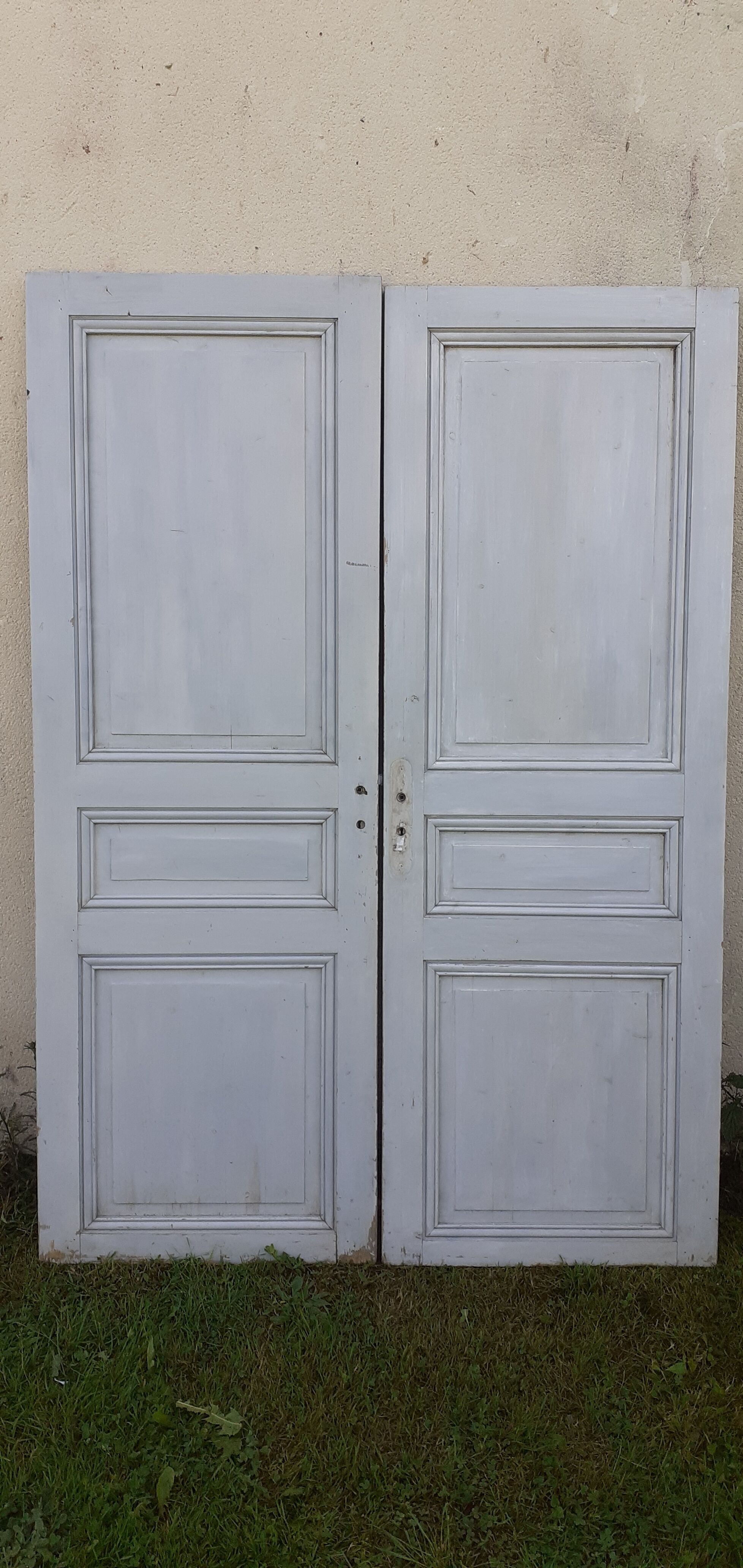 Pairs of Haussmannian doors in patinated aged wood