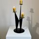Vintage black metal brutalist tripod candlestick