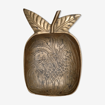 Empty brass apple pocket