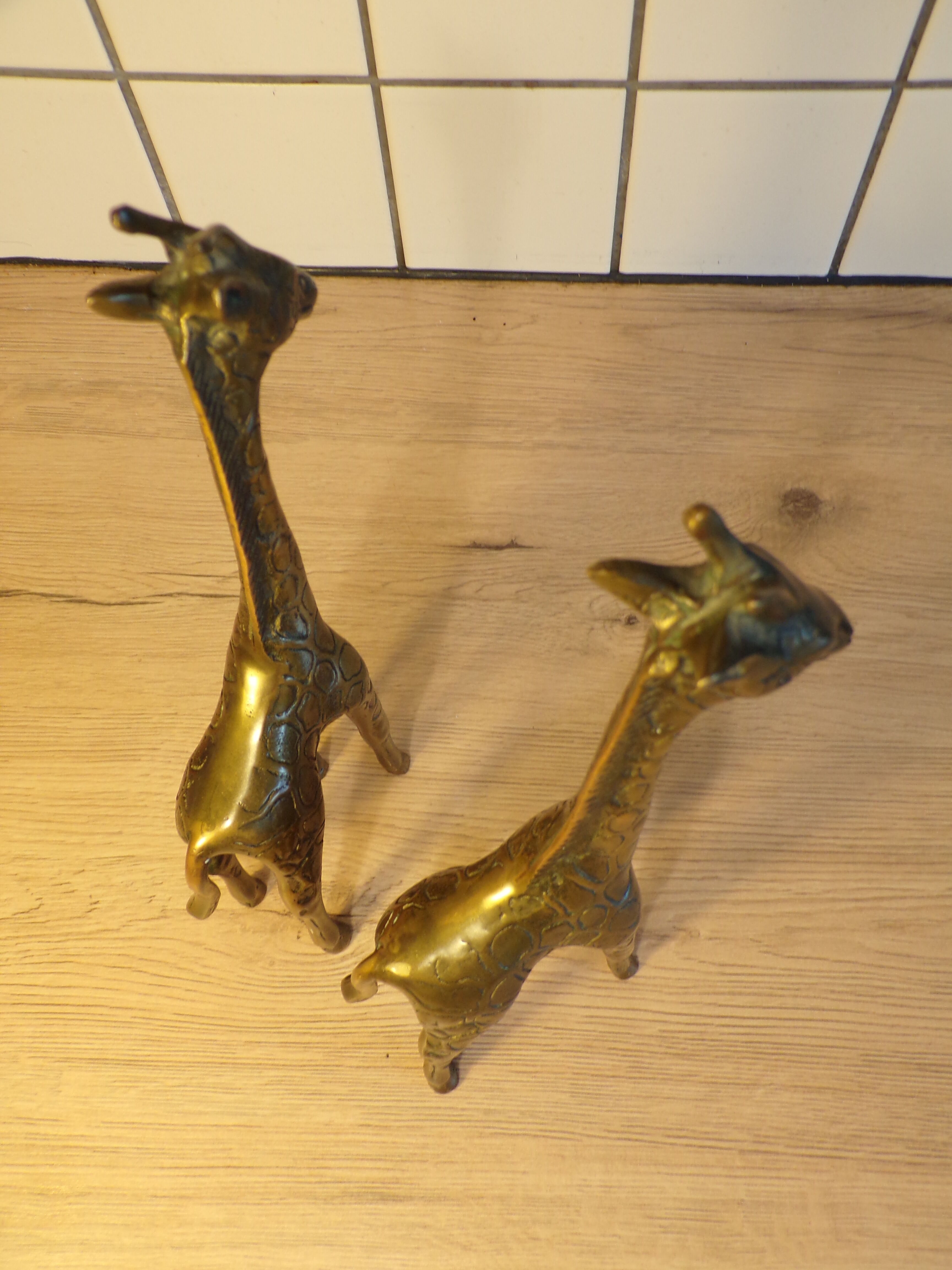 Pair of brass giraffes