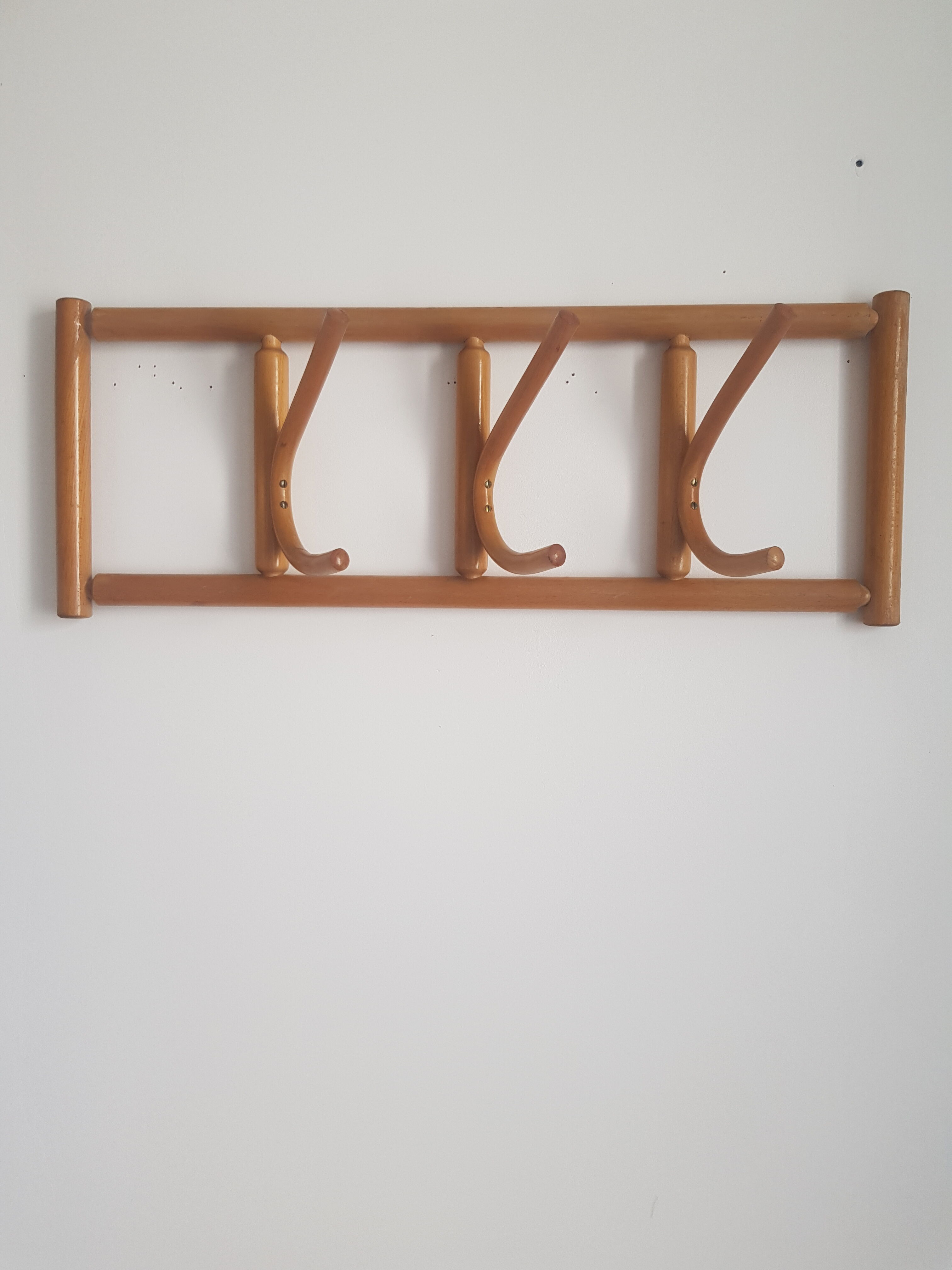 Wooden wall coat rack