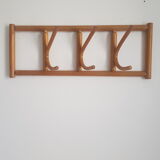 Wooden wall coat rack
