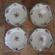 4 plates in faience of Badonviller F.B, floral motif, 20s
