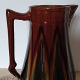 Antique enamelled pitcher
