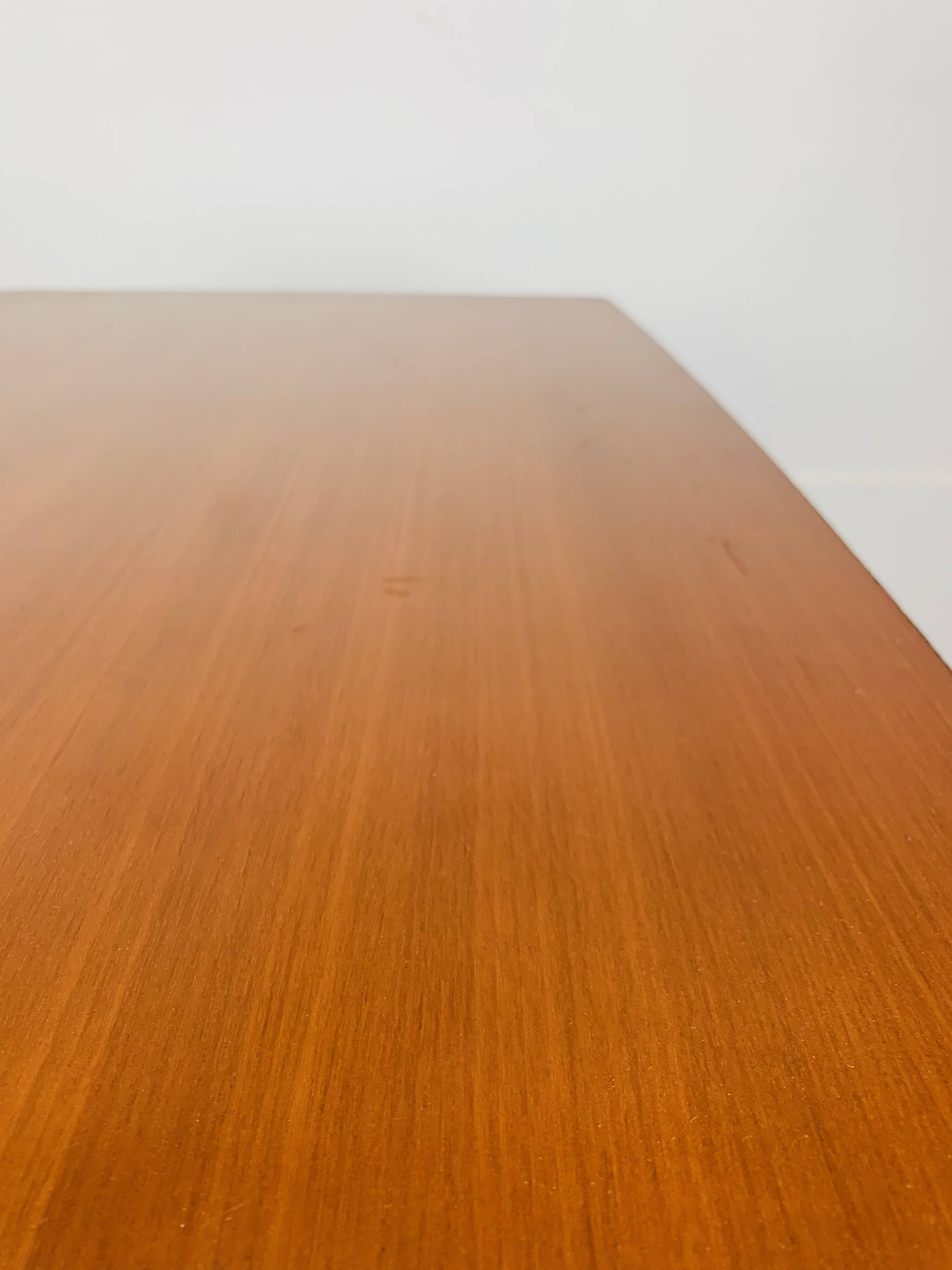 Minimalist Scandinavian teak desk from the 1960s, vintage.