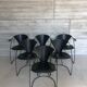 “Armlinda” black leather dining chairs by Arrben Italy