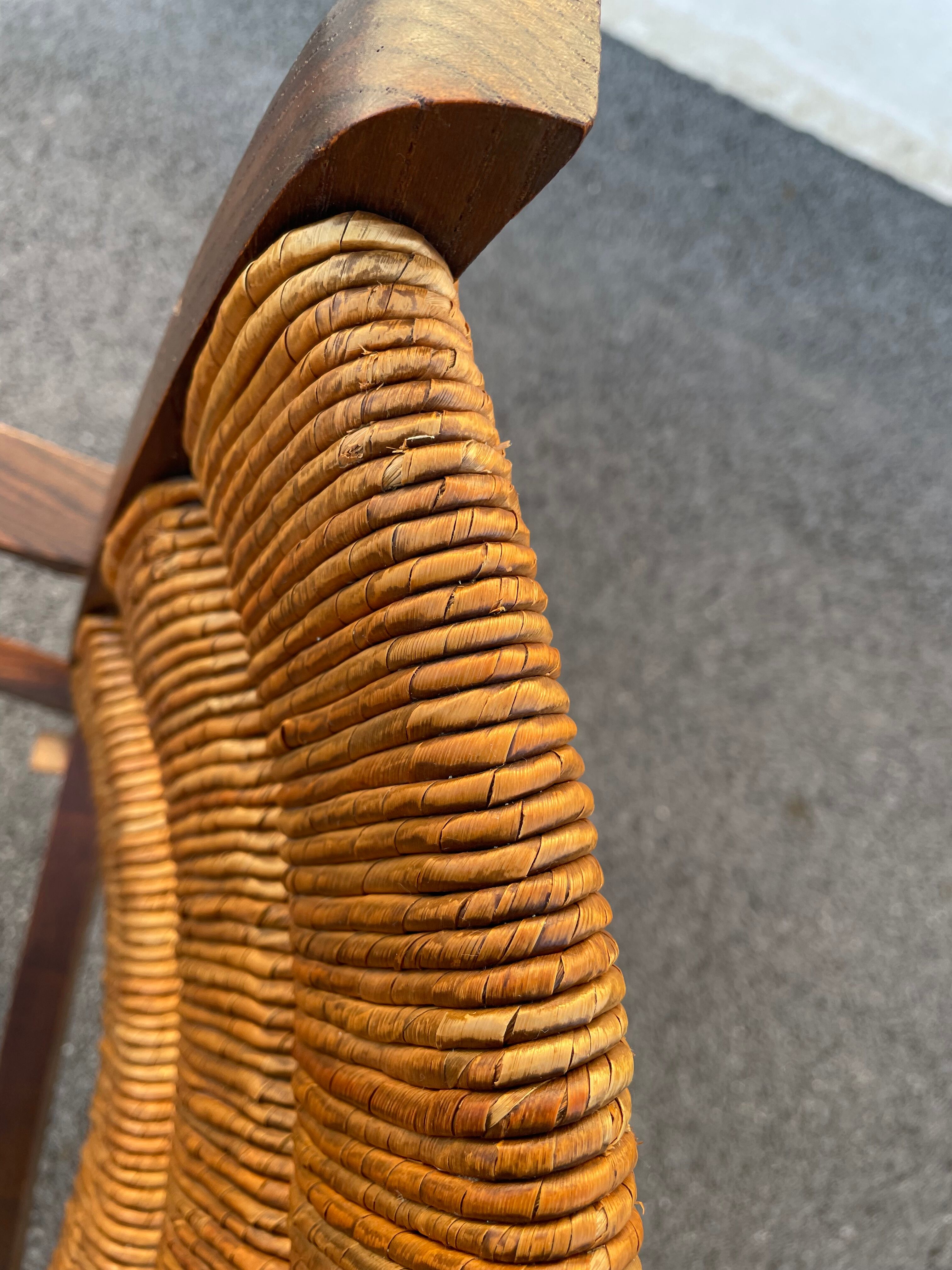 Vintage armchair in straw and brutalist wood