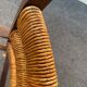 Vintage armchair in straw and brutalist wood