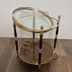 Oval Rolling Table in Brass and Mahogany with Openwork Gallery and Bottle Holder