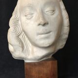 Bronze-middle-aged woman's head in plaster