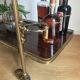 Service bar with vintage wheels in formica and brass 60s