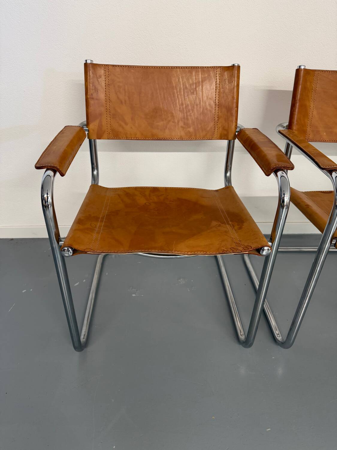 4 vintage tubular chairs with patinated leather designed by Mart Stam
